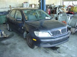 2002 MITSUBISHI LANCER ES MODEL 4 DOOR SEDAN 2.L MT FWD COLOR GRAY 