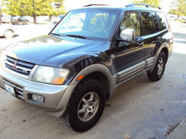 2001 MITSUBISHI MONTERO FULLSIZE, LIMITED, COLOR BLACK, STK # 113545