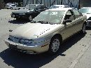 1999 SATURN SL2 1.9L DOHC AT  COLOR GOLD