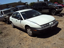 1999 SATURN SL1 4 DOOR 1.9 L ENGINE SOHC, MANUAL TRANSMISSION, COLOR - WHITE , STK # 119797