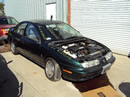1997 SATURN SL2 4 DOOR SEDAN 1.9L DOHC AT COLOR GREEN STK 129828
